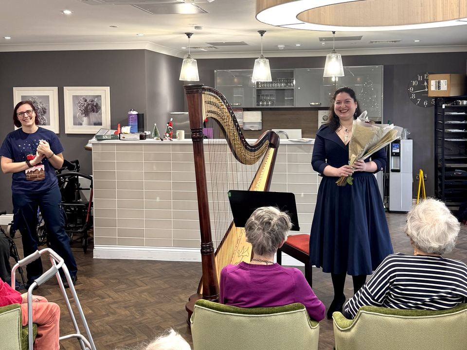 Maria Trotter with her harp