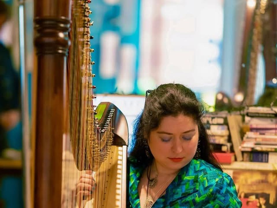 Maria Trotter with her harp