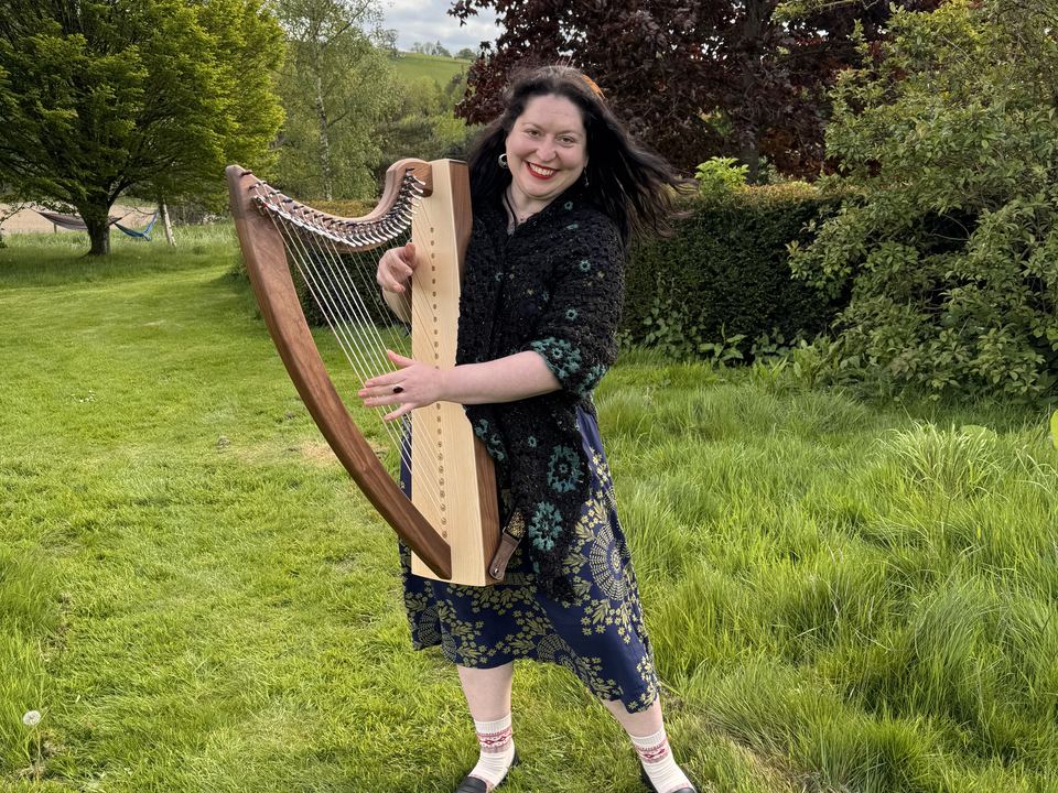 Maria Trotter with her harp