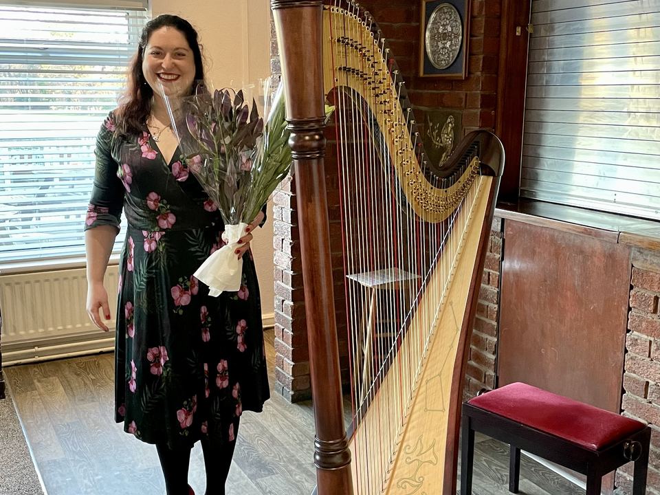 Maria Trotter with her harp